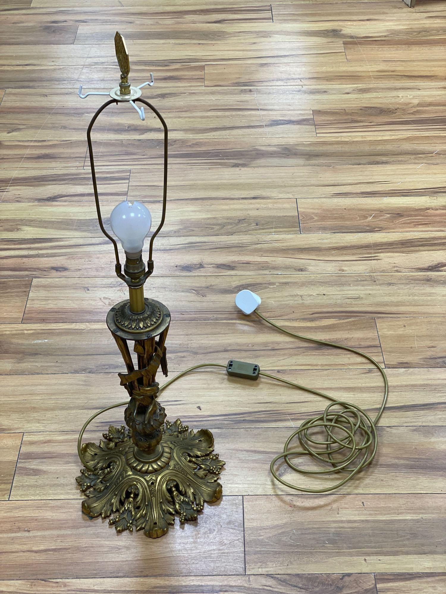 A gilt metal table lamp